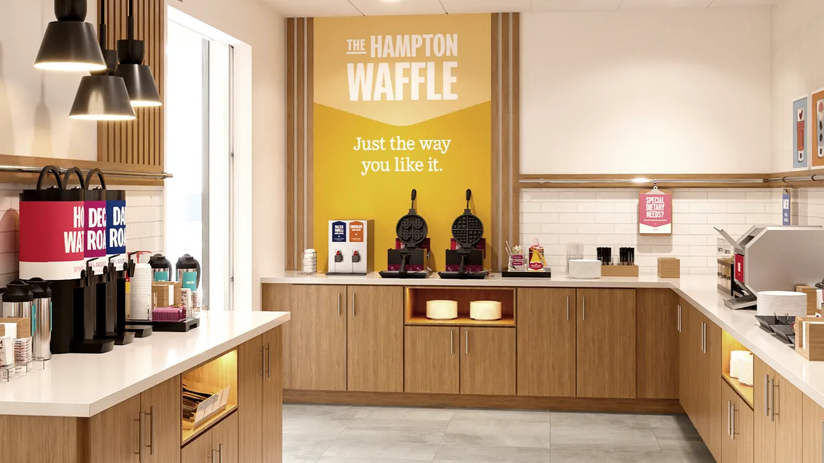 The waffle-making station at Hampton by Hilton.