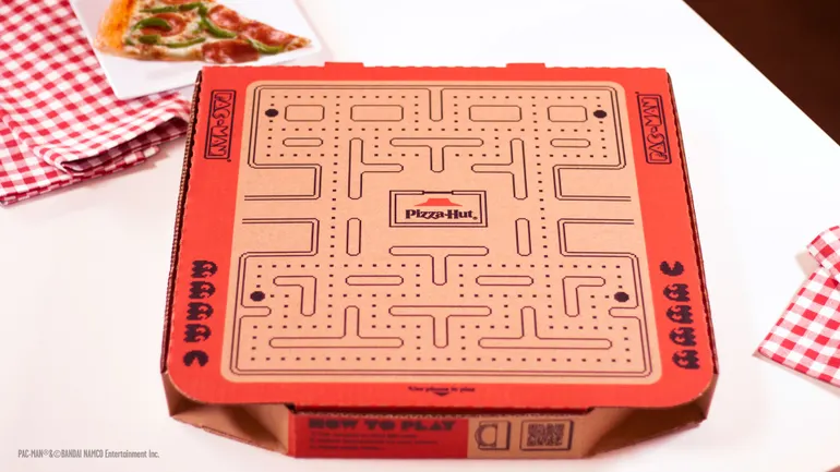 Rephrase single title from this title Pizza Hut spins boxes into Pac-Man AR game for ‘Newstalgia’ campaign . And it must return only title i dont want any extra information or introductory text with title e.g: ” Here is a single title:”