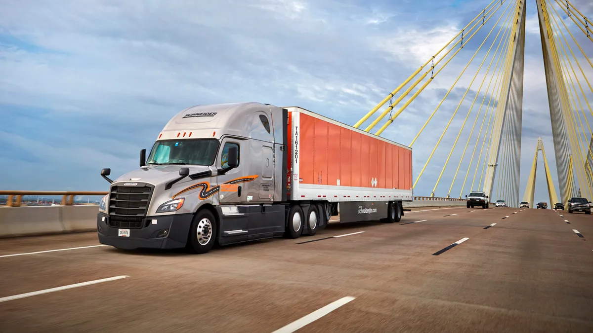 A Schneider National TL truck on a highway