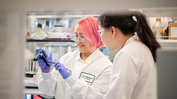 Employees working in the labs of Rapport Therapeutics, which recently began late-stage testing of a potentially first-of-its-kind seizure medication.