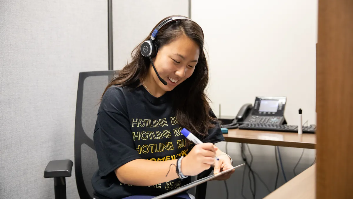 A tutor from California's Harvey Mudd College's Homework Hotline helps a caller in November 2019.