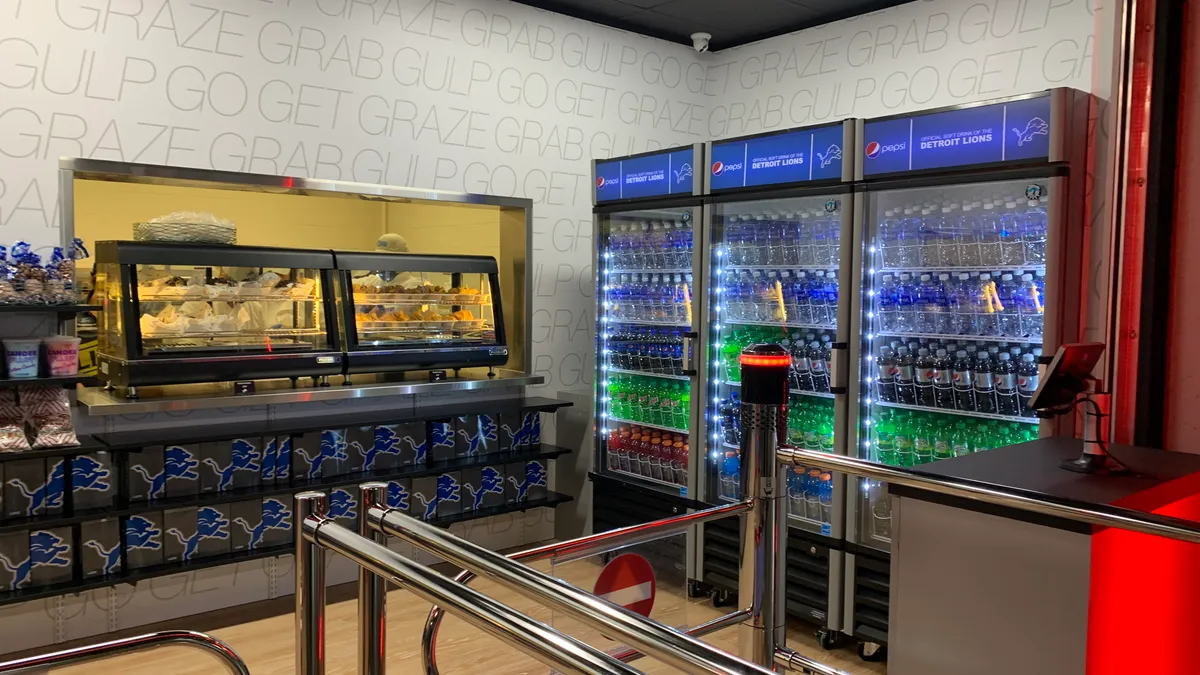 The Ford Field Express Shop, a new checkout-free market at the home of the NFL's Detroit Lions, is shown Dec. 19, 2021. Fans dip a credit card as they walk in, choose foods or beverages and exit.