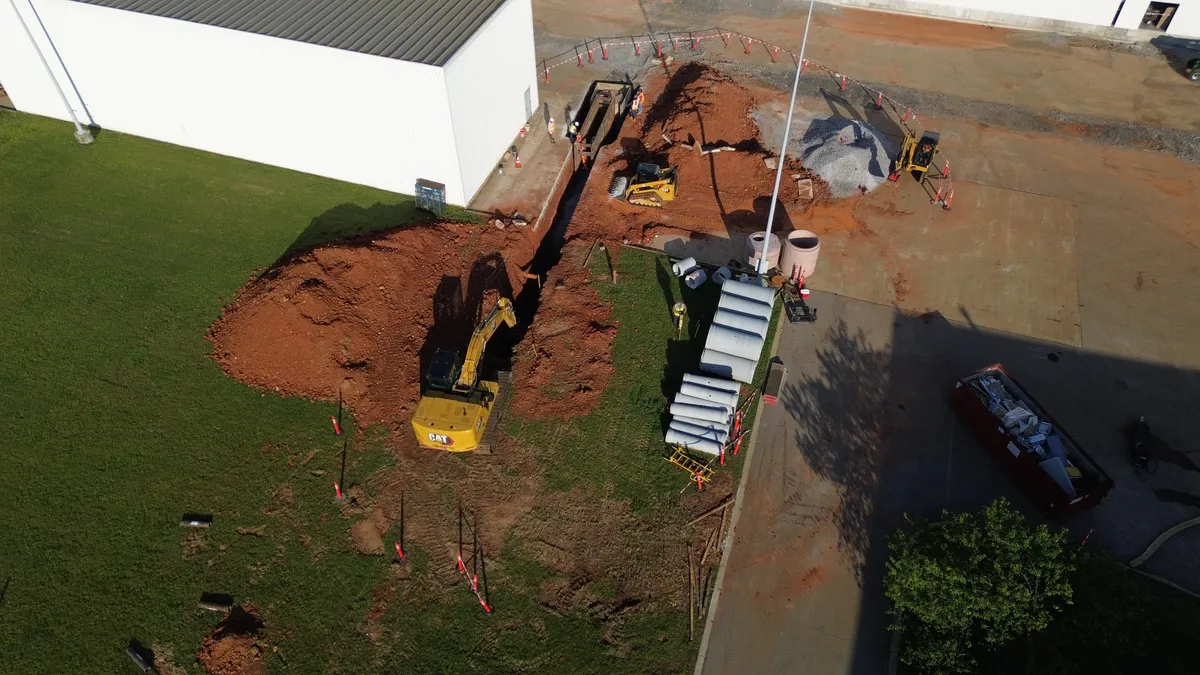 An aerial view of a trench on a jobsite.