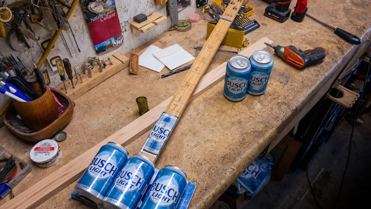 A guitar made out of cans of Busch Light.