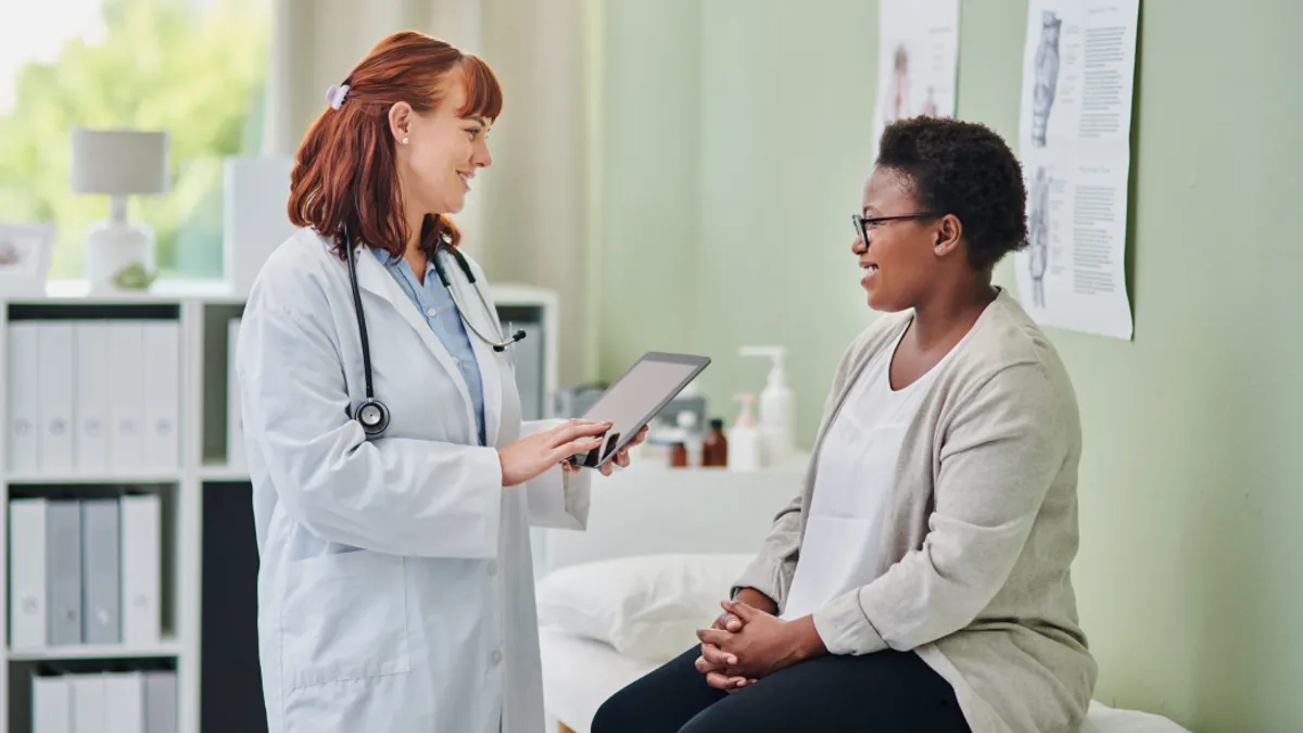 Doctor speaking with patient in the doctor's office