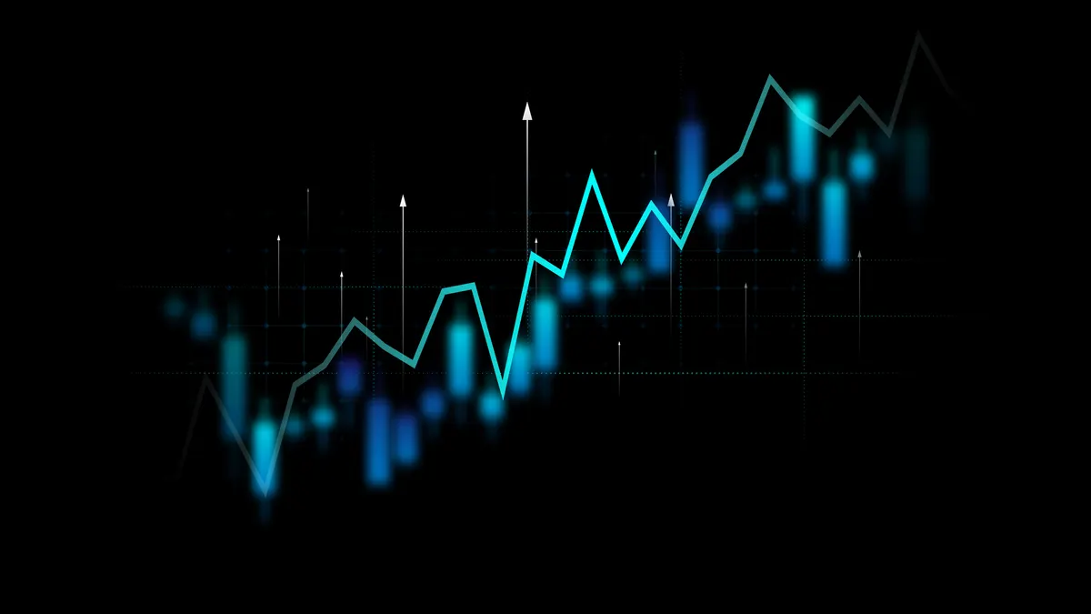 a jagged teal line mirrored by a blue line and set a cross a black background