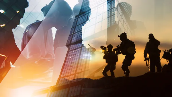 silhouette of solders standing.