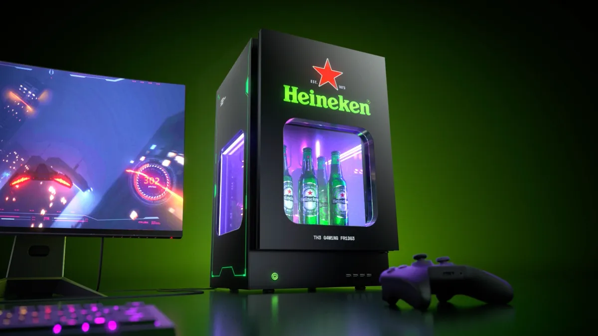 Heineken gaming fridge next to gaming computer and controller