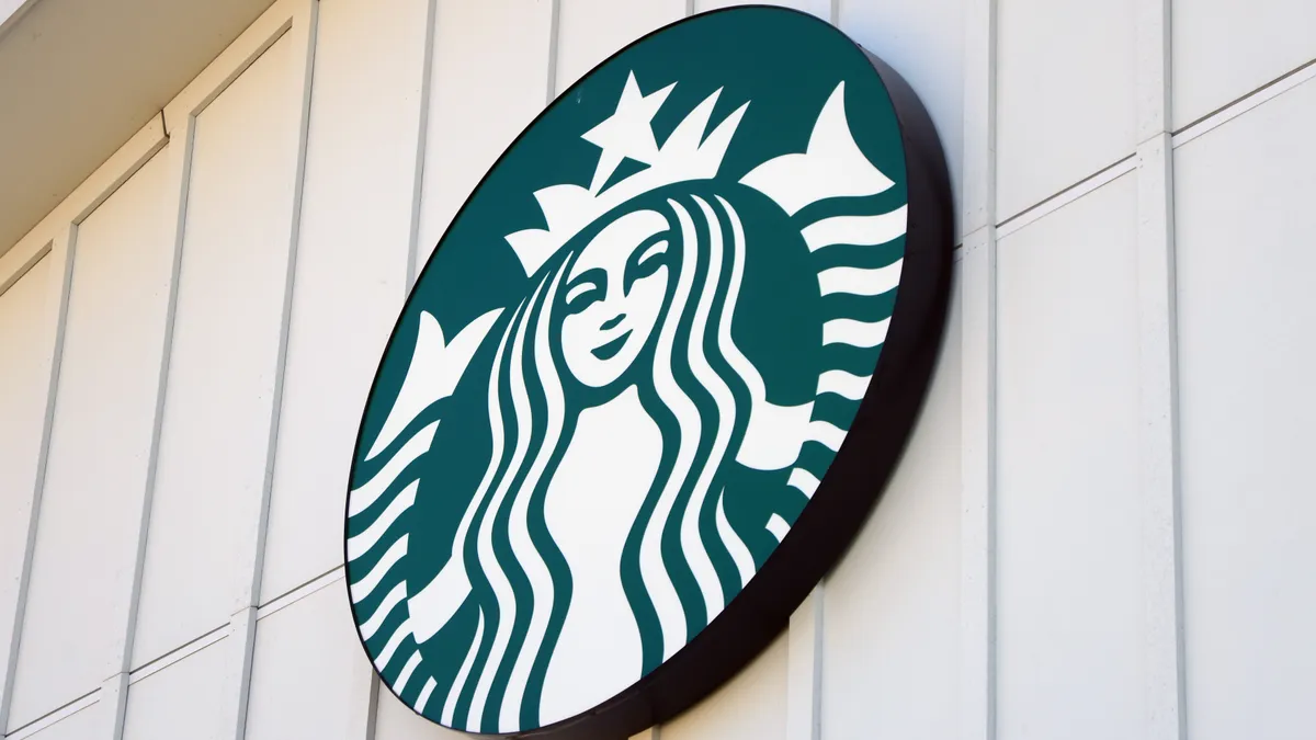 Starbucks logo on building exterior