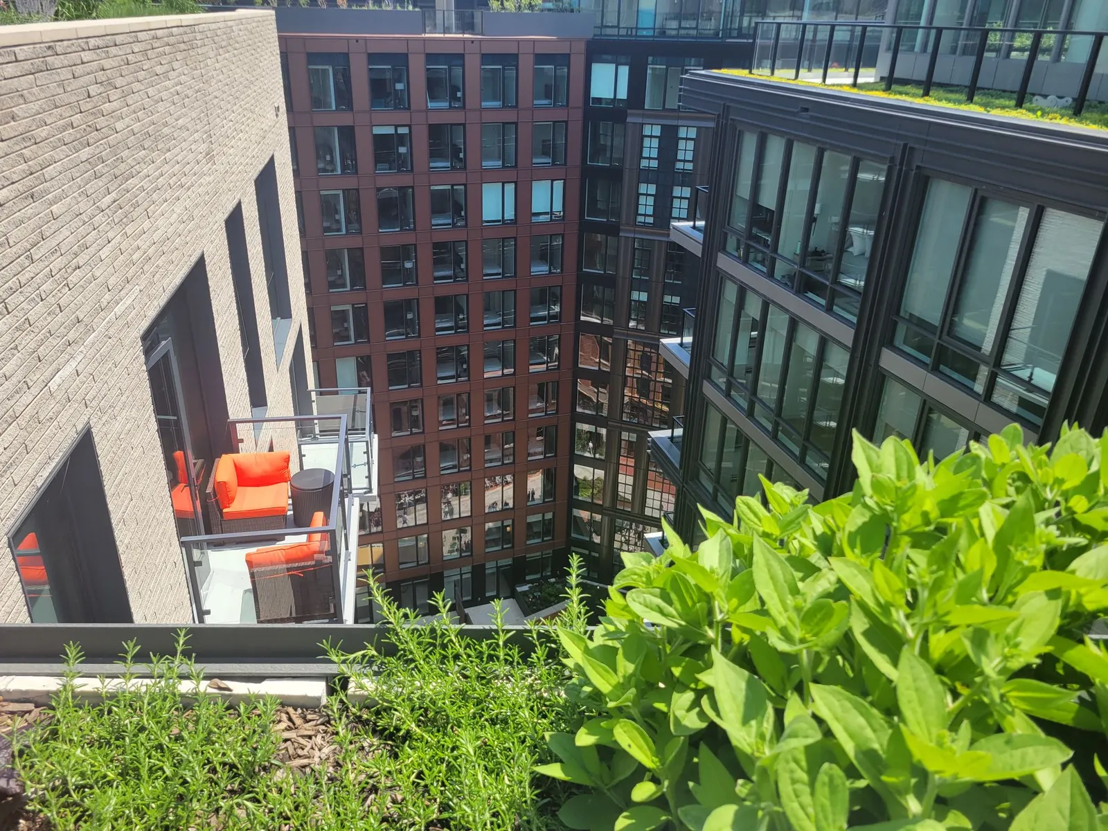 A view from an apartment rooftop of its buildings.