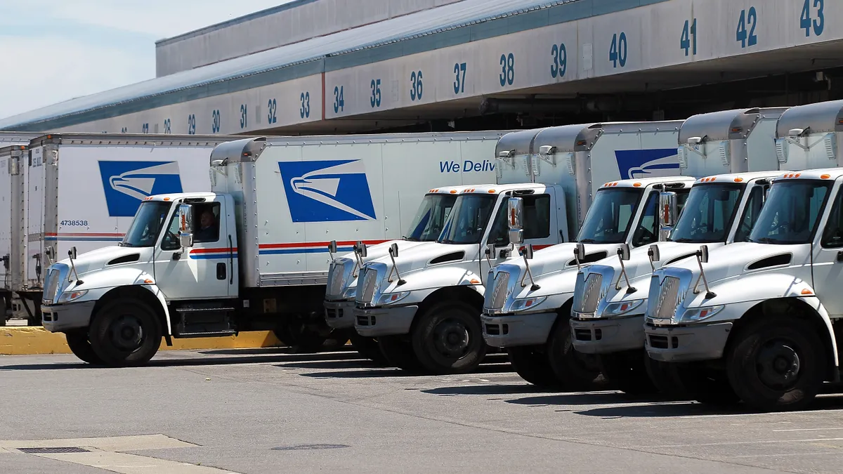 A U.S. Postal Service truck backs into a dock at the U.S. Post Office sort center on August 12, 2011 in San Francisco, California.