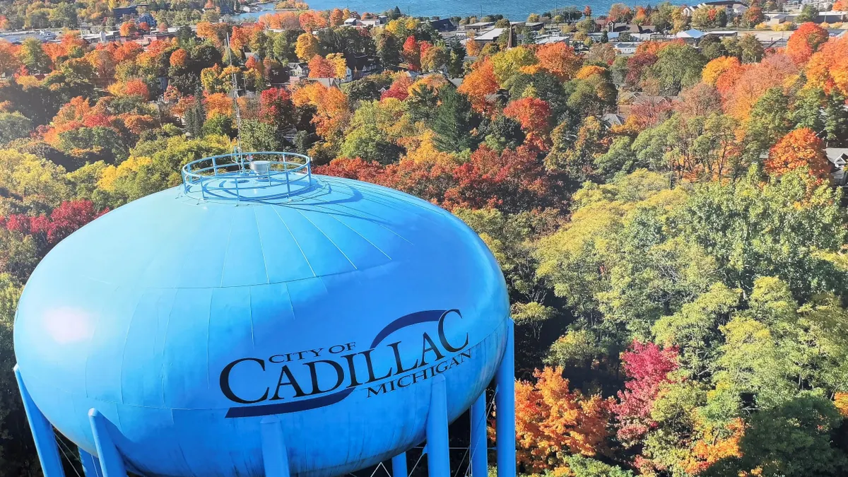 Water tower bearing the logo for the City of Cadillac, Michigan.