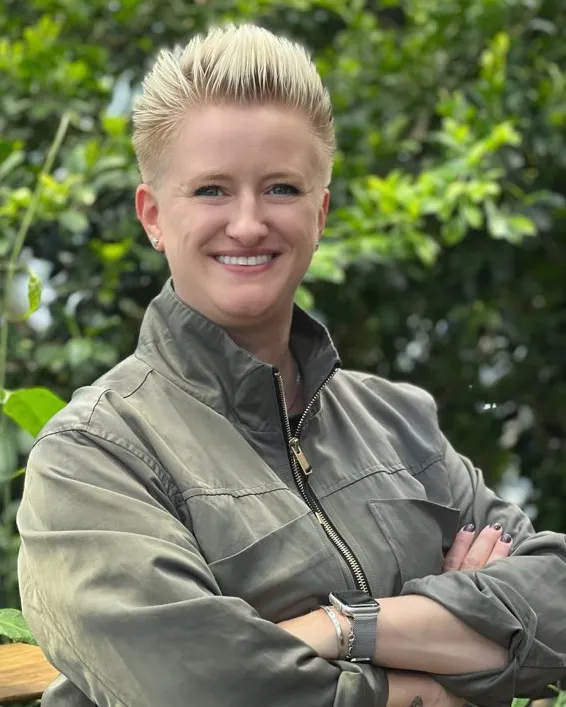 Lisa Conway smiles in a professional headshot.