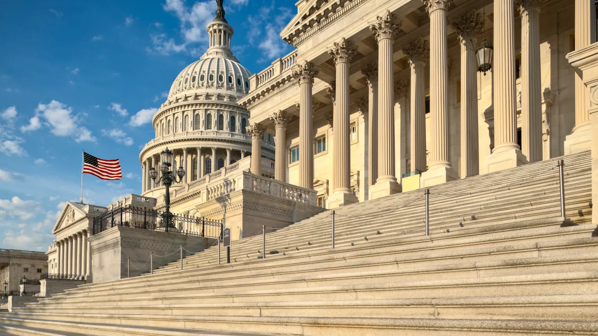 Detail view of the US Capitol east facade in the early morning sun.