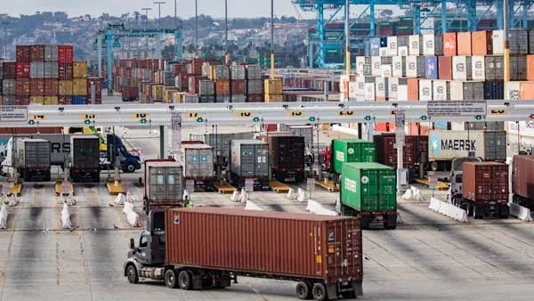 Trucks entering a terminal at the Port of Los Angeles in California