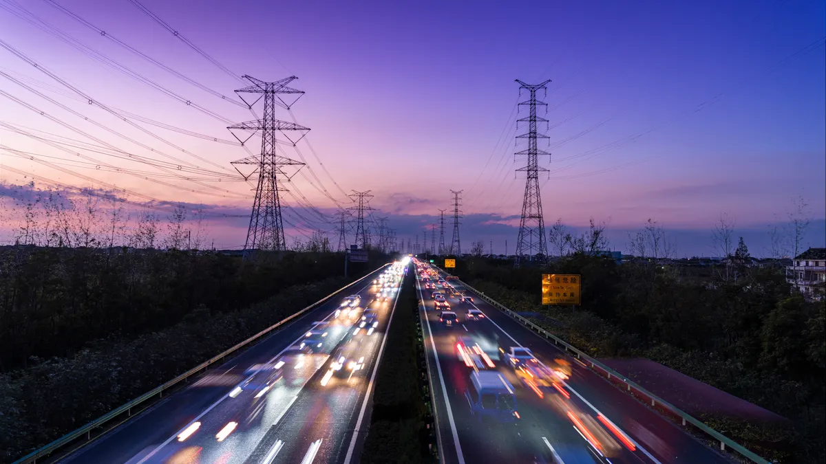 View of a road with cars rushing