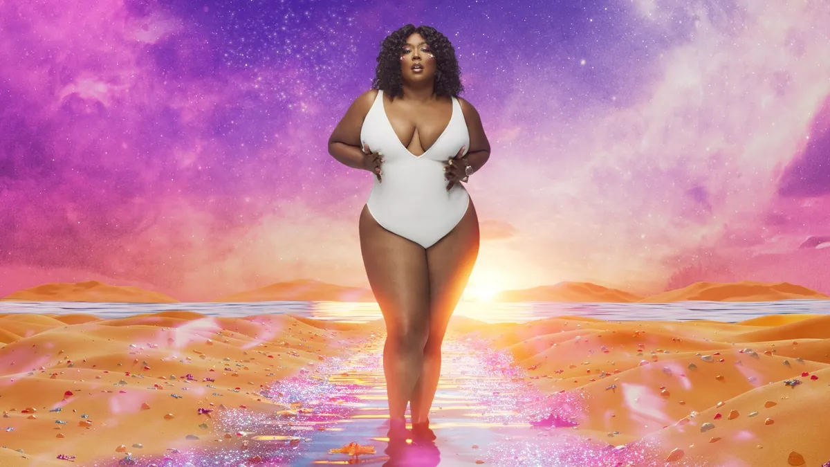 Lizzo wearing pieces from Yitty's swimwear collection