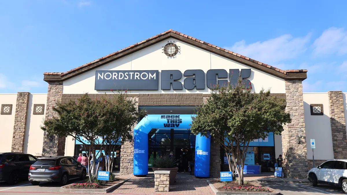 A store entrance on a sunny day.