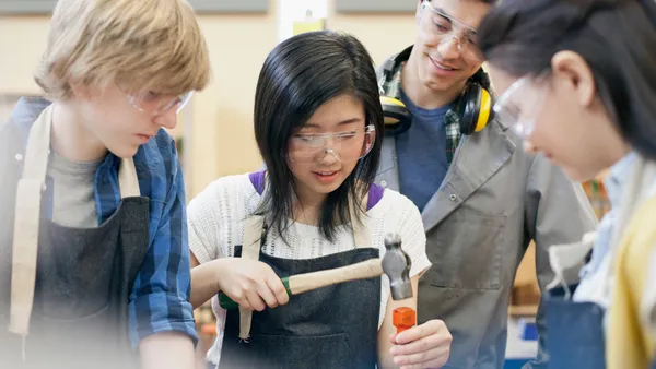 Group of students engaged in technical education.