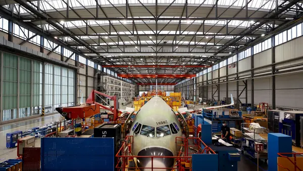 A plane within the A320 passenger aircraft family is pictured at the assembly line at the Airbus factory on Jan. 18, 2022, in Hamburg, Germany.