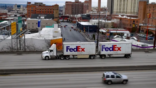 A FedEx Freight truck pulls a double trailer on Interstate 90 in Spokane, Washington, in March 2022.