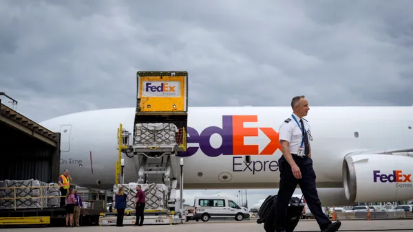 Pallets of baby formula are unloaded from a FedEx cargo plane upon arrival at Dulles International Airport on May 25, 2022 in Dulles, Virginia.