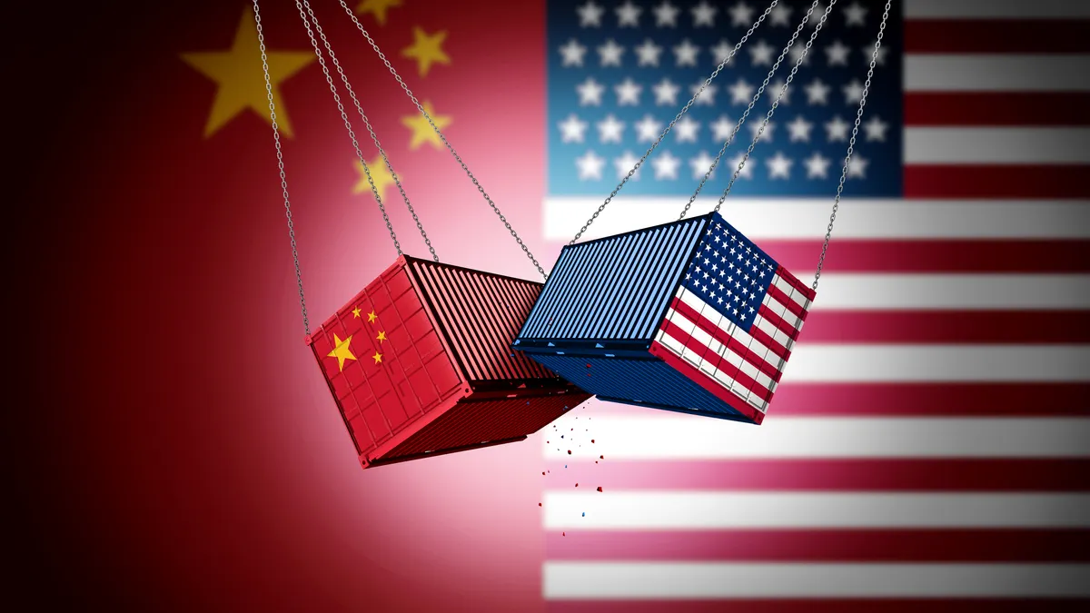 Two cargo freights with the U.S. and China flags on them bumping into each other.