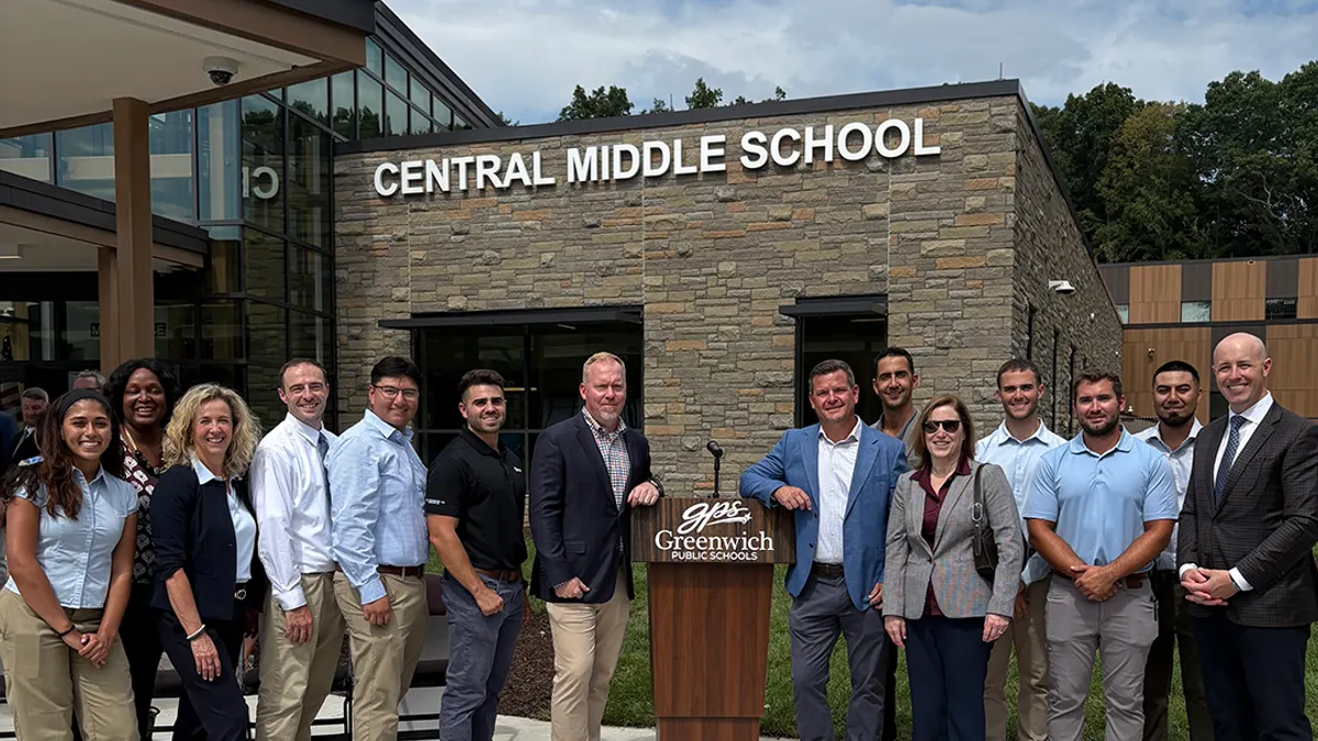 Stakeholders celebrate the opening of Greenwich Central Middle School in Greenwich, Conn. Turner Construction built the project.