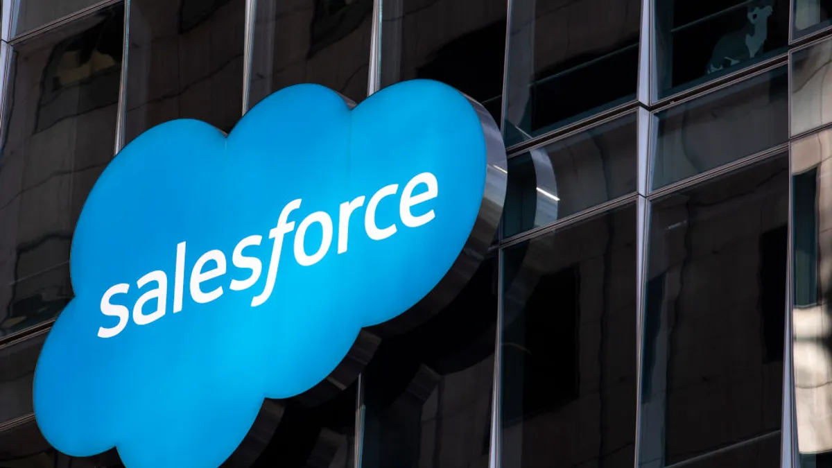 The cloud-shaped salesforce logo is shown on the side of a building, the company's headquarters.