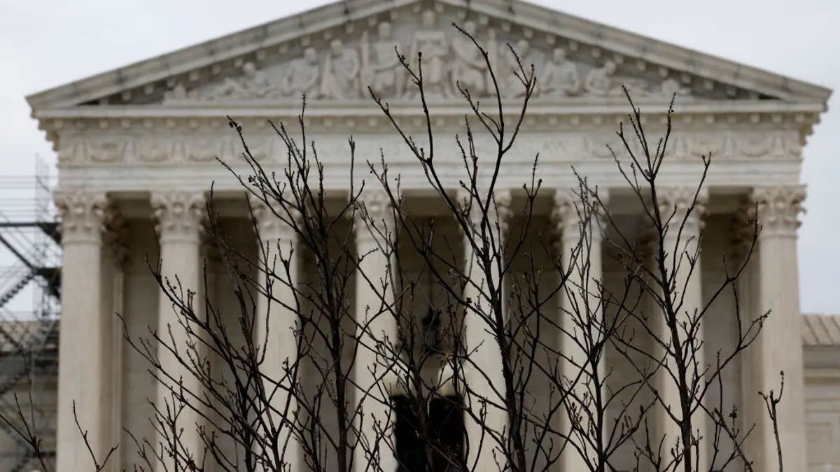 Branches slightly obscure the facade of the U.S. Supreme Court building April 07, 2023 in Washington, DC