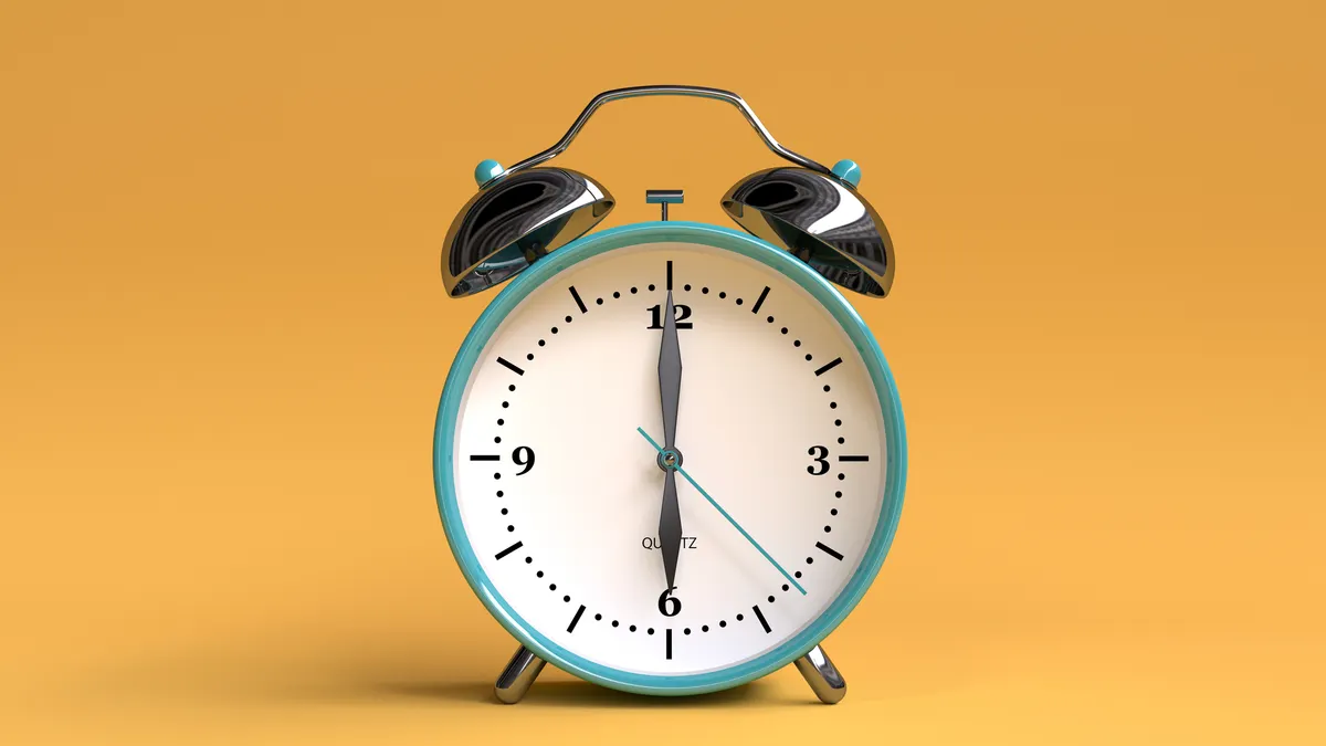 old alarm clock on yellow background - 6 o'clock - 3d illustration rendering