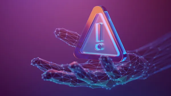 Warning, attention symbol with exclamation mark in the triangle on the abstract human hand made with atom array and plexus effect