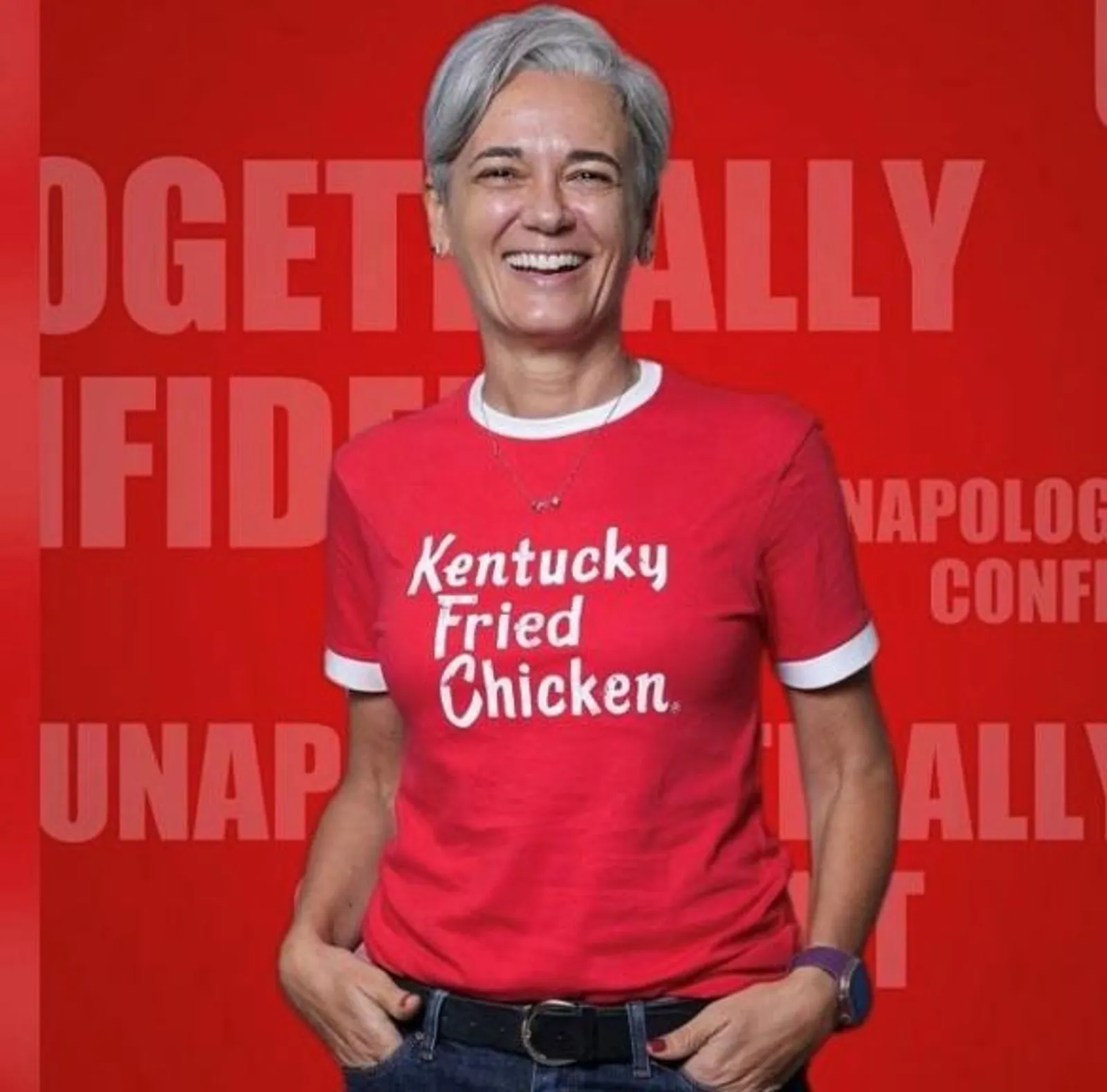 A photograph of a person wearing a red shirt and jeans.