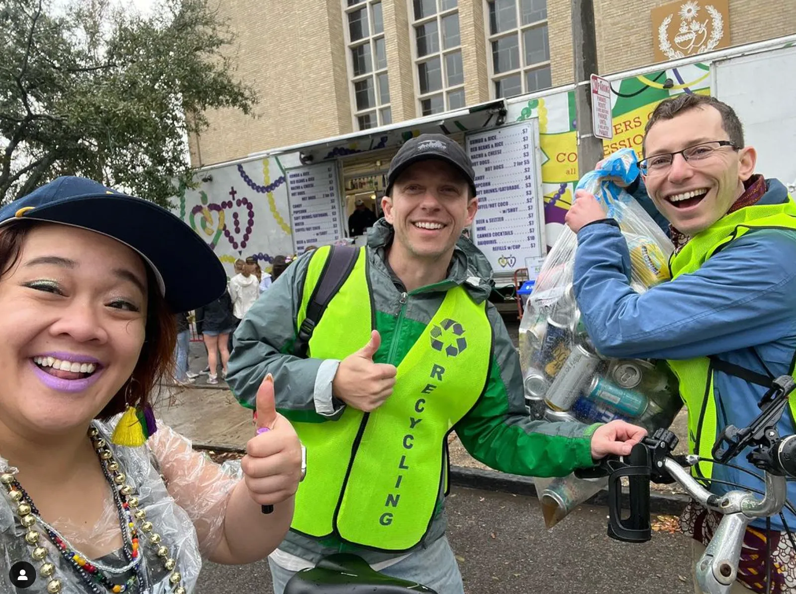 Anna Nguyen with NOLA Ready, Brett Davis with Grounds Krewe, and Scott Breen with CMI, collaborate on recycling cans during Mardi Gras 2024.