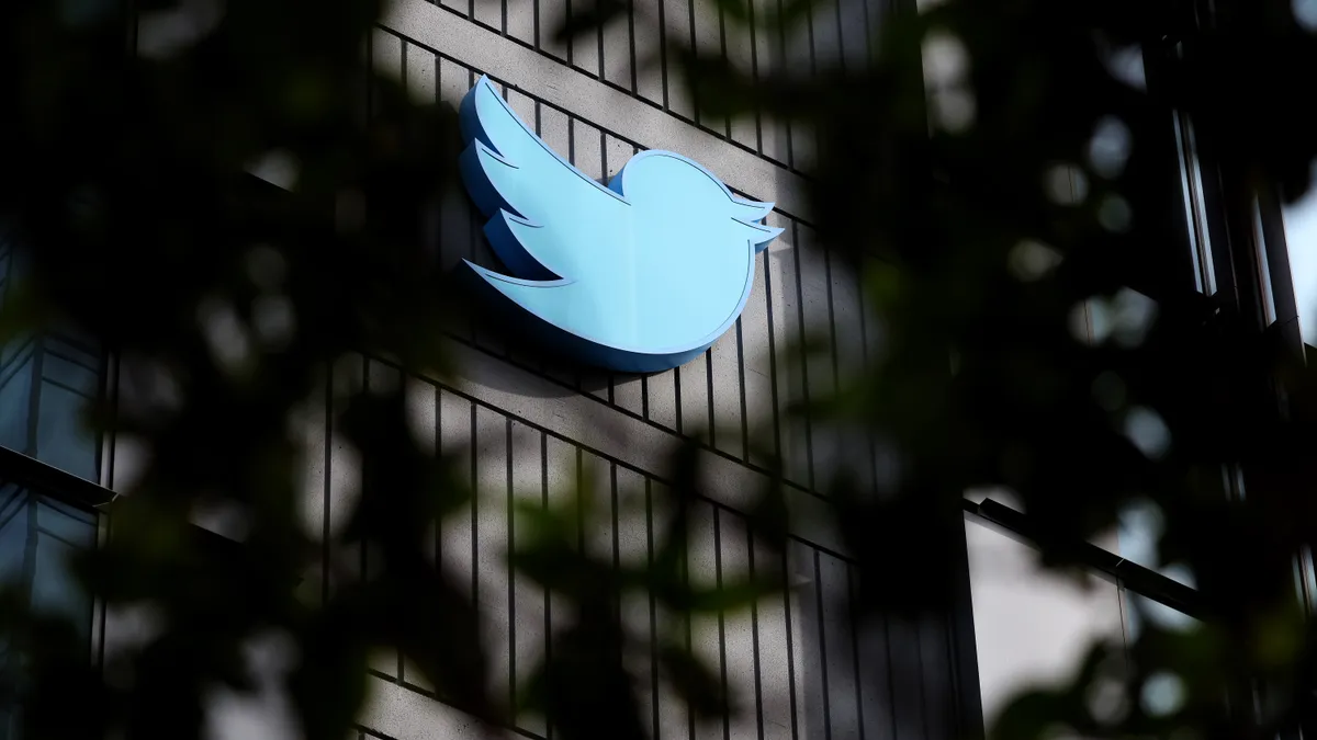 Twitter's bird logo is seen on an office building.