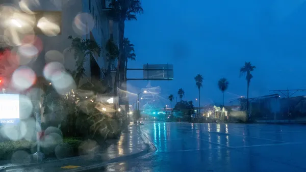 Rain falls on an empty street in Tampa, Florida.