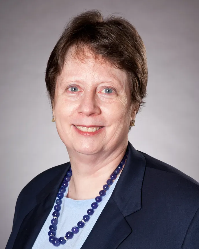 A headshot of construction attorney Carol Sigmond.