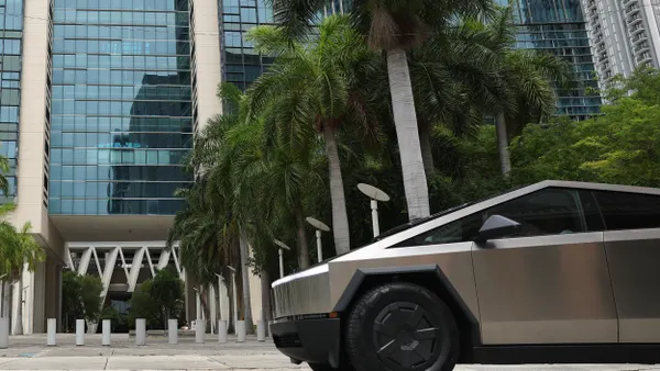 A Tesla Cybertruck in front of a Miami courthouse on July 14, 2025
