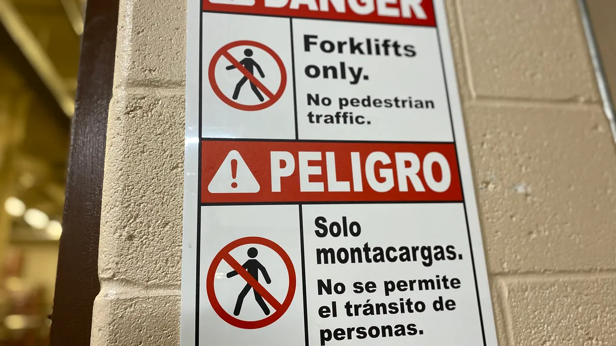 Two signs -one in English, the other Spanish- at the Hershey facility in Hazleton, Pennsylvania