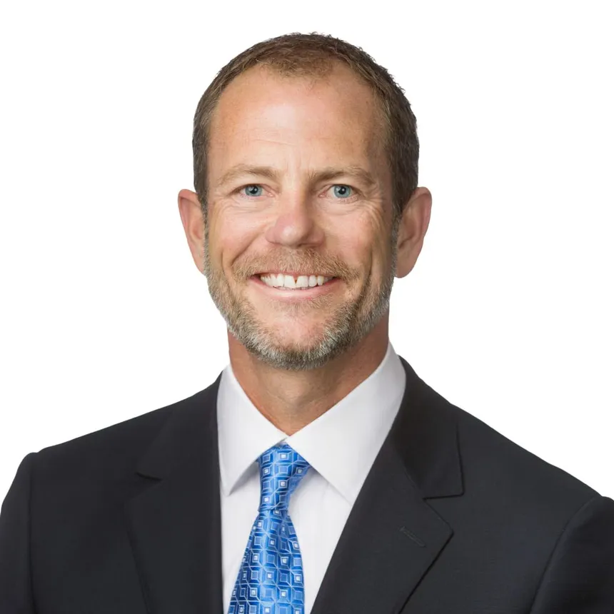 A headshot of MMI CEO Mark Toland.