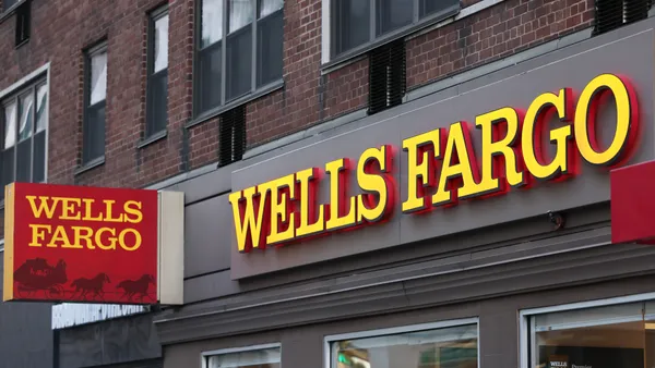 A Wells Fargo bank signage is seen on Broadway on December 20, 2022 in New York City.