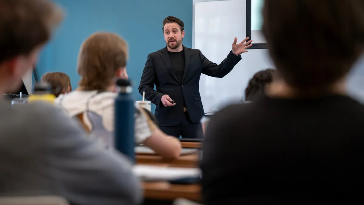 Mustafa Akben presenting to classroom