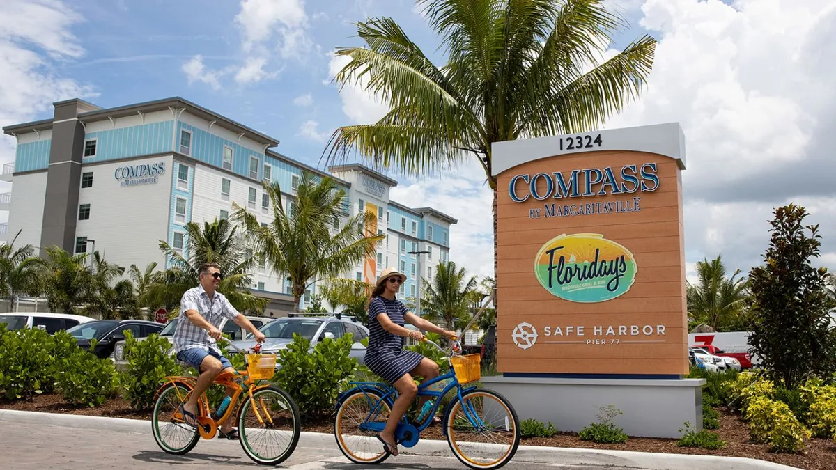 The exterior of a Compass by Margaritaville hotel.