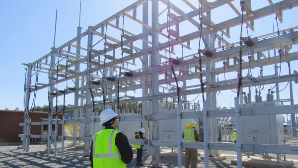 work men at an energy plant