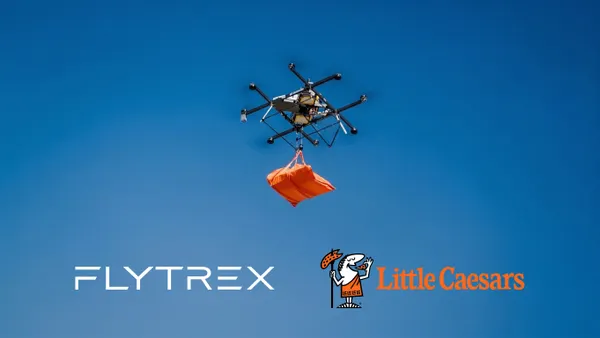 A drone carrying an orange pizza delivery bag.