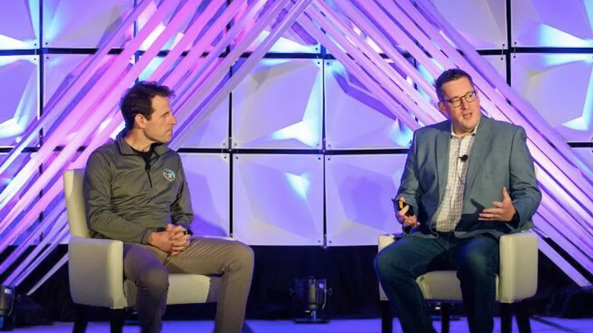 Men talking at a conference