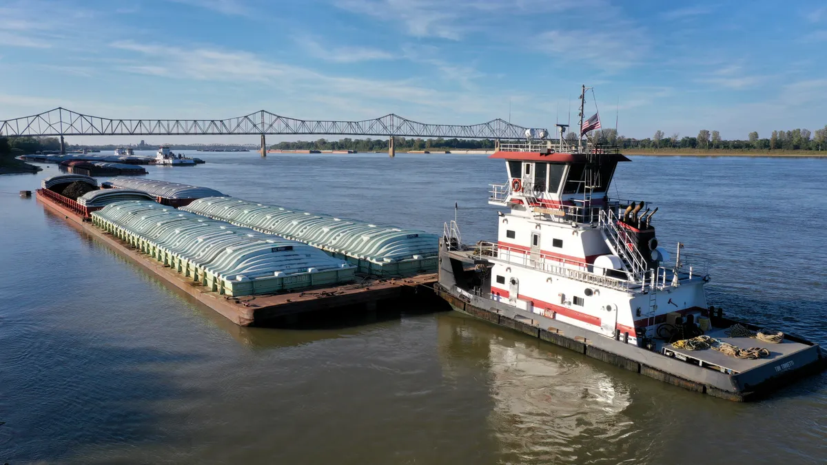 A tug pushes barges on the Ohio River on October 12, 2021 near Cairo, Illinois.