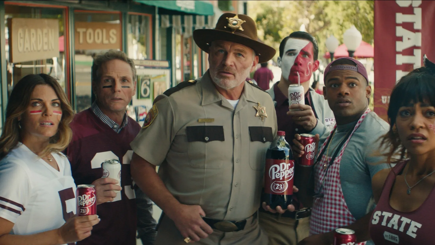 A group of people in a Dr Pepper ad