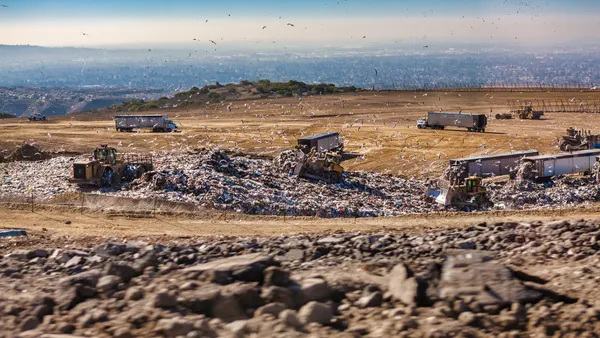 Southern California Landfill with trash, blue sky, seagulls