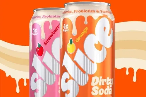 Two cans of Slice soda are next to each other in a marketing image.